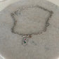 Ketting met bedel met gekleurde steentjes