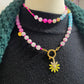 Kralenketting (roze) met bloem