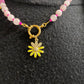 Kralenketting (roze) met bloem