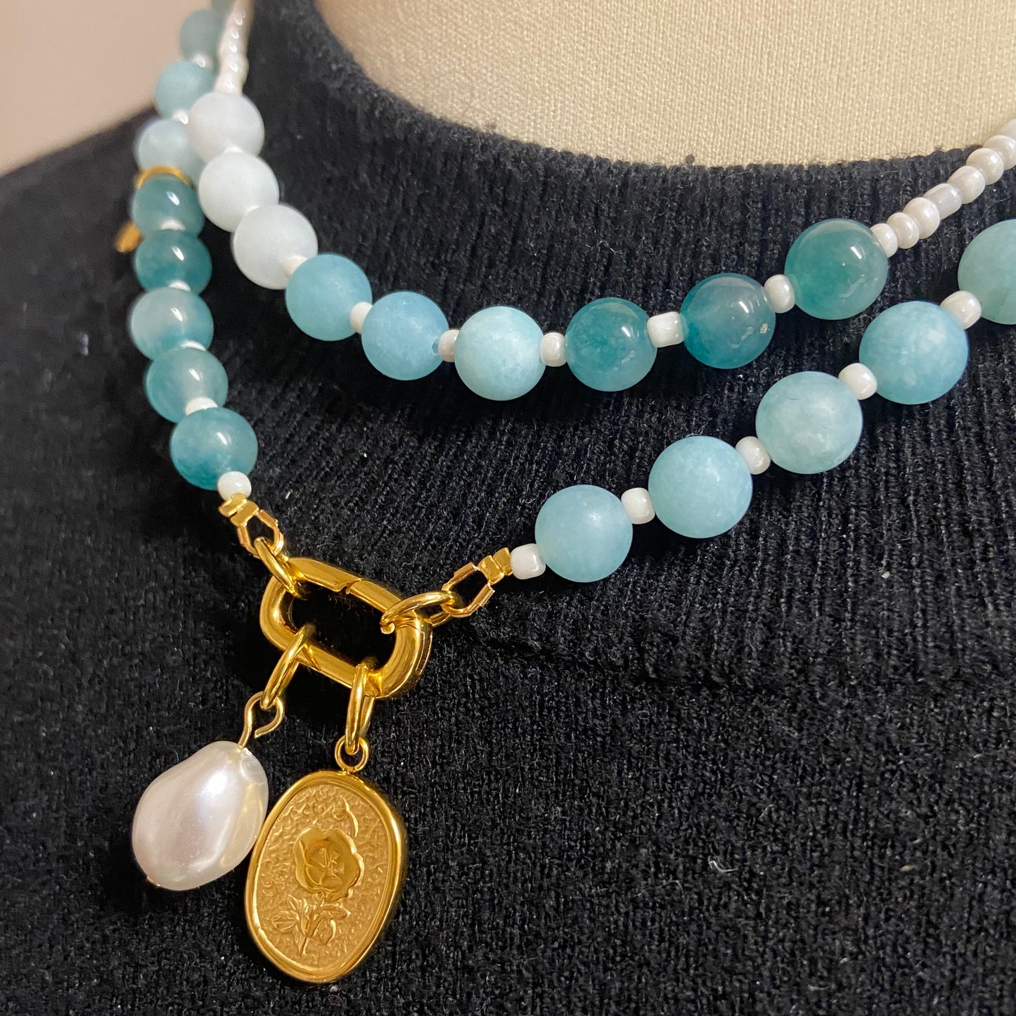 Kralenketting (groen) met 2 bedels
