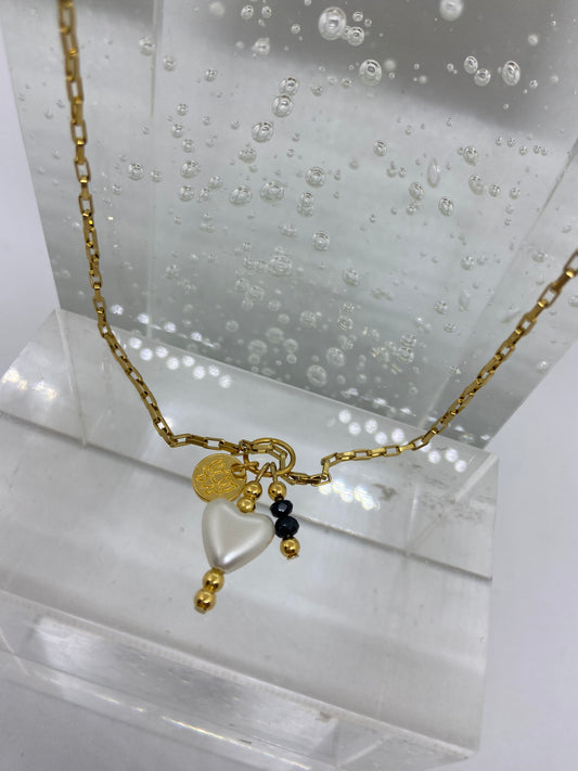 Ketting "met een wit hartje"