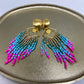 Oorbel met kralen (roze, blauw, groen, beige)